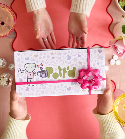 Craft mat with colorful design and motivational steps for enlightenment on a pastel purple background.